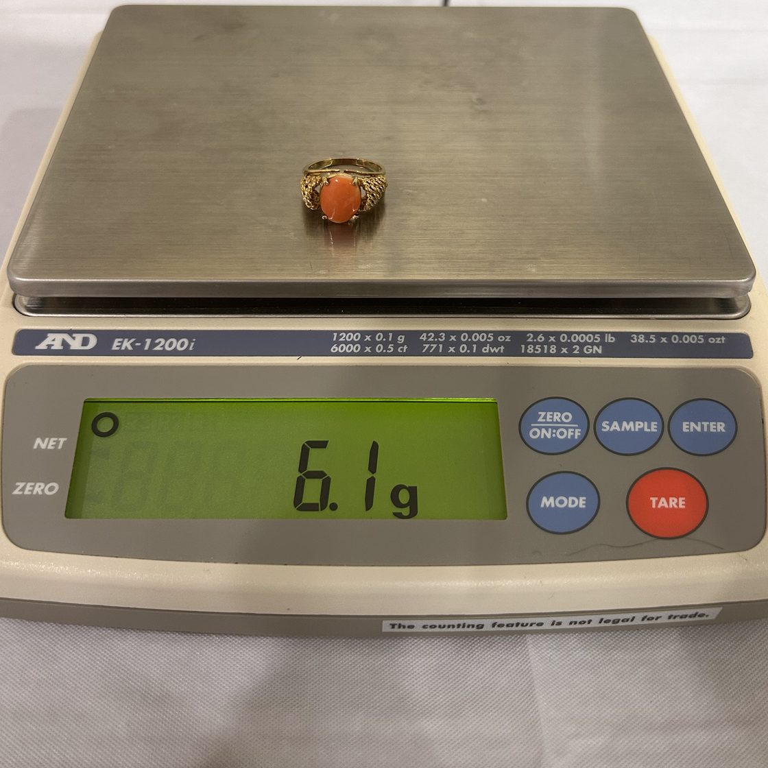 Coral cocktail ring on the GoldVara scale