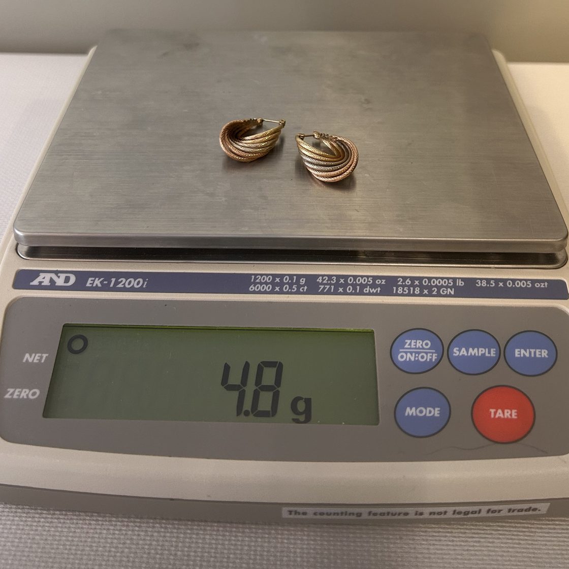 Tri-color twisted hoops on the GoldVara scale